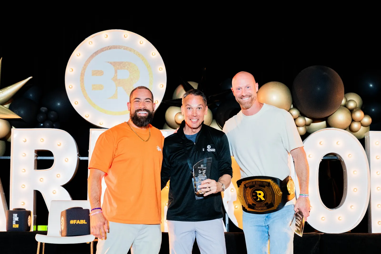 Roger Burnett with peers at an awards ceremony